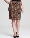 Exotics go executive with this cheetah-print MICHAEL Michael Kors Plus skirt. Polish off fierce silhouette with sleek pumps and take charge of the fashion pack.