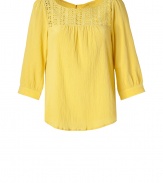 Bring sunshiny style to your day look with this retro-inspired top from Paul & Joe Sister - Round neck with knit panel, gathering at bust, three-quarter puff sleeves, back button placket, button detailed cuffs, relaxed silhouette - Style with high-waisted flared jeans, platform sandals, and a fringed shoulder bag