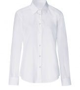 Classic blouse in fine white cotton - Stylish and simultaneously trendy thanks to the narrow-waisted silhouette - Arbitrator blouse cut with collar, long sleeves and button panel - Timeless basic that should be a part of every wardrobe - Combine with leather pants, pencil skirt or designer jeans to create many stylish looks