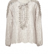 Detailed in intricate lace, Anna Suis silver-grey top is an exquisite take on lady-chic - Slit neckline with tie at throat and tonal trim, long sleeves with tonal trim on the shoulders, scalloped hemline - Loose fit - Play with contrasts and style with an edgy leather leggings and slipper-style loafers