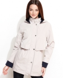 A blustery day calls for Nautica's lightweight hooded anorak. Contrasting colored cuffs and lining (plus a layered-look front) give this classic unique new look.