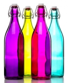 Refill and redecorate. Italian bottles boasting vibrant tinted glass and an easy-to-secure swing top are a brilliant solution for topping off drinks without leaving the table. Display in a kitchen window or shelf for a pop of color.