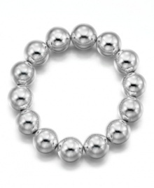 An opulent and alluring bracelet fit for any occasion. In silvertone mixed metal. Measures approximately 7 inches long.