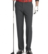 Take the green in comfort and style with these flat-front golf pants from Izod.