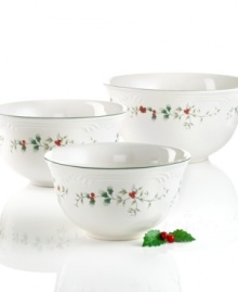 Mix up some joy this holiday season with the beautiful look of Pfaltzgraff's Winterberry mixing bowls. Vibrant holly berries and leaves dance across these stoneware pieces with decorative green detail rims. (Clearance)