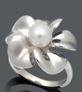 Embrace sweet spring style with a fashionable flower. Ring features a smooth sterling silver setting with a cultured freshwater pearl (7-8 mm) at center. Size 7.