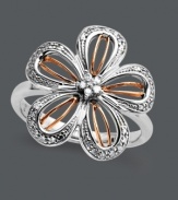 Get fabulous in florals. This chic, blooming flower features a sterling silver setting with 14k rose gold accents and round-cut diamonds at the petals and center (1/8 ct. t.w.). Size 7.