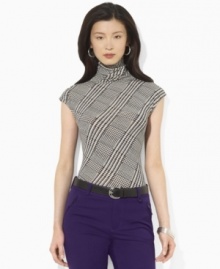 Lauren Ralph Lauren's bold houndstooth pattern adds heritage appeal to a cap-sleeve petite top, crafted in sleek stretch jersey for comfort.