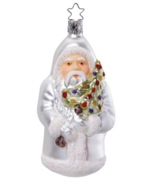 Intricately hand-painted, St. Nicholas comes dressed in silvery white to bring a timeless Christmas ornament to your tree. Mouth-blown in Germany for superior detail and lasting beauty.