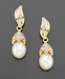 Drop earrings that sparkle with elegance. Cultured freshwater pearls (8 mm) and round-cut diamonds (1/5 ct. t.w.) are set in 14k gold.