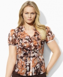 Lauren by Ralph Lauren's plus size airy blouse is designed in sheer, crinkled georgette with romantic ruffles and a bright floral print for an elegant modern look.