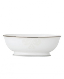 Refine your formal table with classic cream and white. Trimmed in platinum and accented with a raised dot and scroll pattern, this Opal Innocence Scroll vegetable bowl from Lenox brings contemporary grace to special occasions. A pearlized finish adds subtle shimmer. Qualifies for Rebate