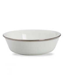 Beautiful in its simplicity, this dinnerware collection features a timeless, elegant design. The pristine white bone china is accented by a single, shimmering band of platinum. The understated beauty will add a refined sophistication to your dining experience for years to come. This all-purpose bowl is an essential serving piece for entertaining. Qualifies for Rebate