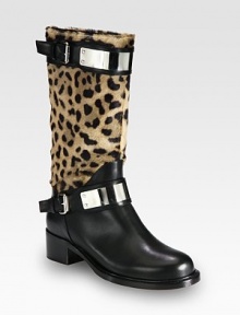 Lush pony hair takes on an exotic print in this leather staple with sleek metal accents and buckle straps. Stacked heel, 1¾ (45mm)Shaft, 11Leg circumference, 13½Leopard-print pony hair and leather upperPull-on style with adjustable buckle strapsLeather lining and solePadded insoleMade in Italy