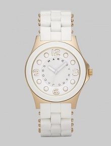 A sleek, understated timepiece with goldplated stainless steel accents and silicon wrapped bracelet.Quartz movement Water resistant to 5 ATM Goldplated stainless steel case, 36.5mm, (1.43) White dial Numeral and dot hour markers Second hand Silicon wrapped stainless steel bracelet, 18mm, (.71) Imported 