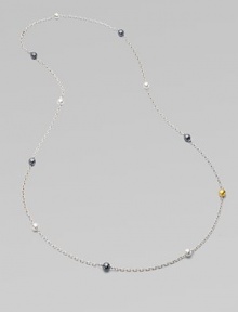 From the Caviar Collection. One extra long, ultra graceful chain of sterling silver, dotted with hammered beads of polished silver, blackened silver, and 24k yellow gold.Sterling silver and 24k yellow goldLength, about 50Spring clip claspImported