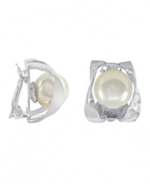 A timeless tradition for style excellence. Majorica earrings feature white, organic, man-made pearls (10 mm) set in a swirling, sterling silver clip on setting. Approximate drop: 1 inch.