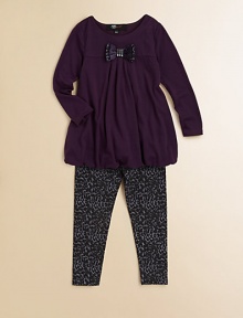 A pretty set that pairs a bow accented tunic with animal print leggings for a chic look. Tunic ScoopneckLong sleevesPull-on styleBow accentedBubble hem71% polyester/24% rayon/5% spandex Leggings Elastic waistband57% cotton/38% polyester/5% spandexMachine washImported