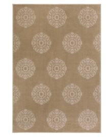 A smart medallion pattern meets tonal tan hues in this Tribecca rug for a sophisticated presentation. Soft, durable polypropylene construction and neutral tones make it a welcome addition to any room in the home. (Clearance)