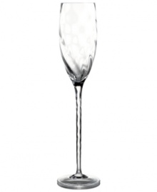 A subtle twist that begins at the rim and unravels at the base of the stem gives the Pleated Swirl flute a look that's fresh, elegant and undeniably chic. From the head-turning Marchesa by Lenox glassware collection.