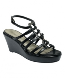 All is well in this chunky wedge by Marc Fisher. The Okay sandals complement any casual look.