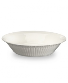 From Mikasa's collection of dinnerware and dishes, the neoclassical Italian Countryside pie dish brings the ease of sunny Italy to your informal entertaining. In creamy white glazed ironstone, it has a elegantly flared rim to showcase a flaky sweet or savory pie crust.