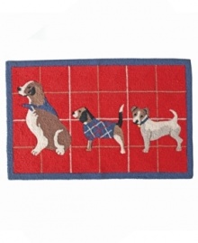 Put a bit of pep in your step with this adorable Holiday Dog accent rug. Features a trio of cute pups with a red plaid backdrop to fill your home with some holiday cheer.