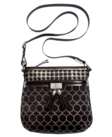 Add some signature style to your everyday accessorizing with this logo pattern crossbody from Nine West. Outfitted with the iconic 9s monogram, chic silvertone hardware and tassel accents, this dreamy design makes any ensemble a bit more heavenly.