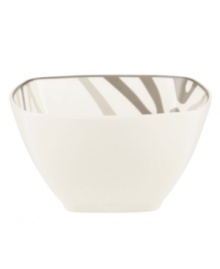 Abstract markings in soft shades of khaki fill in this glazed white bowl for unconventional elegance. From Noritake dinnerware, these dishes are trimmed with matte platinum. Its sleek, modern shape looks sharp on casual and formal tables alike.