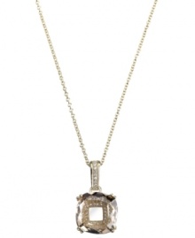 Sparkling and stunning. CRISLU's pendant necklace features a large-scale clear cubic zirconia complemented by glittering cubic zirconia accents (5-1/2 ct. t.w.). Set in 18k gold over sterling silver. Approximate length: 16 inches + 2-inch extender. Approximate drop: 5/8 inch.