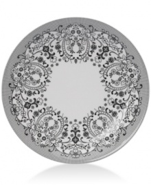 Oleg Cassini weaves a table of playful sophistication with the round Ava platter, featuring lacy flowers and dots in timeless black and white.