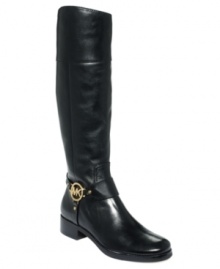 Charmed, I'm sure. MICHAEL Michael Kors' Fulton Harness boots feature a metallic designer logo charm on the strapped ankle harness, adding a sense of shine to an otherwise polished style.