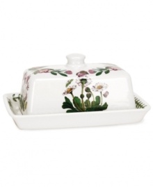 Part of Portmeirion's much-loved Botanic Garden tableware series, this covered butter dish features a botanical motif of daisies. Easy knobbed top is decorated with several fluttering butterflies. Crafted in stoneware that is microwave and dishwasher safe. Measures: 7x5.