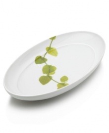 Forever spring. Bright new leaves plucked just for your table drape this oval vegetable bowl for a fresh, modern look. From Mikasa dinnerware, the dishes of this Daylight set are durable and stylish in white porcelain with a uniquely sloped rim and raised interior.