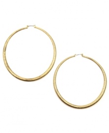 Hoop to it! Every girl needs to add a standout pair of hoop earrings to her collection. RACHEL Rachel Roy's extra-large style features a click backing crafted in gold-plated mixed metal. Approximate diameter: 3 inches.