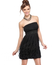 Feathery ruffles give movement to this strapless party dress from Roberta! Style it with fun accessories and dance the night away!