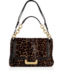 Upgrade ladylike office looks with Diane von Furstenbergs statement leopard print haircalf bag, complete with a sleek iPad case for a sophisticated take on tech - Front flap with magnetic snap closure, snapped back slit pocket, double zipped and snapped iPad pocket underneath with chocolate leather trim, chain detailed satchel handle, leather shoulder strap, lip-shaped mirror attached to handle, red interior, inside zippered back wall pocket, 4 front wall slit pockets - Perfect for dressing up work and off-duty looks alike