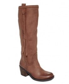 Long and lean. Nine West's Thora tall boots are western-insipred with woven detail and cool tassels along the shaft.