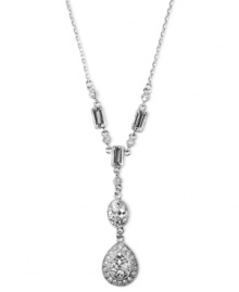 Exude 1950s era elegance in this vintage-inspired classic by Givenchy. Y-shaped pendant features round-cut and rectangular crystals set in silver tone mixed metal. Approximate length: 15 inches.