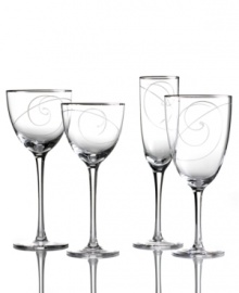 Combining a luxe platinum edge and fanciful swirls in fine crystal, the Platinum Wave wine glass from Noritake styles formal tables with refreshing elegance.