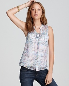 This sheer Alcee shirt flaunts a playful print and a drawstring tie at the yoke for a flirty finish. Layer it over a basic tee with your favorite cut-offs and spring into the season with style.