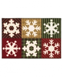 A series of ultra modern snowflake and print designs lend a fun and festive statement to your floor in this Shaw Living area rug. Woven in the USA of recyclable nylon.