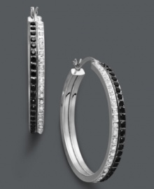 Two rows of subtle, contrasting sparkle make a huge impact on traditional hoop earrings. Crafted in sterling silver, these sweetly shimmering hoops feature round-cut white and black diamond accents. Approximate diameter: 1-1/4 inches.