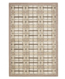 A traditional basketweave plaid is updated for the modern home in this area rug only from Martha Stewart rugs. Hand tufted in India of long wool fibers, this luxurious home accent presents unparalleled comfort and style underfoot.