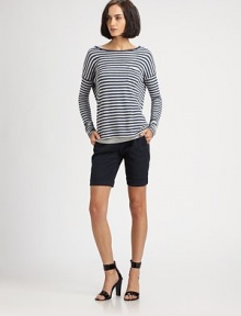 Fine stripes add just the right graphic touch to this soft and slouchy jersey pullover.BoatneckDropped shouldersChest pocketPullover styleAbout 25 from shoulder to hem94% rayon/6% nylonDry cleanImportedModel shown is 5'10 (177cm) wearing US size Small. 