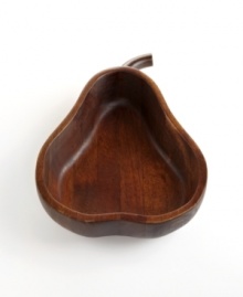 Add a bit of natural intrigue to your table with this wooden pear bowl from The Cellar. Crafted of pure Acacia wood, its rich tone and smooth texture are sure to enhance the look of your tablescape.