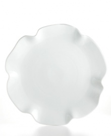 With its fluttering, flared edges, the Ruffle serving platter adds a few soft curves to your contemporary Whiteware dinnerware collection from The Cellar.