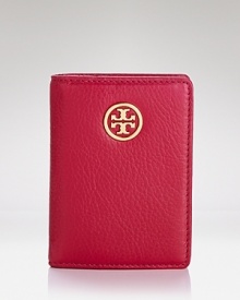 Crafted from pebbled leather and accented by a subtle logo plaque, this transit pass holder from Tory Burch is just the ticket to unerring style.