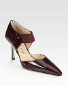 Patent leather point toe pump has a low-cut front, skinny heel and an elastic Mary Jane strap for a tailored fit. Self-covered heel, 3½ (90mm)Patent leather and elastic upperLeather lining and solePadded insoleMade in Italy