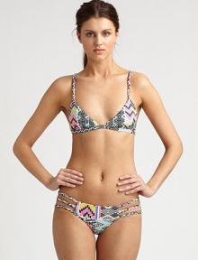 From its lively, multi-colored print to its bohemian-inspired, braided straps, this bikini has it all, including the right amount of stretch for a great fit.Braided strapsTriangle cupsBack clasp closureCriss-cross backBraided sides on stretch bottomFully lined80% nylon/20% spandexHand washMade in USA